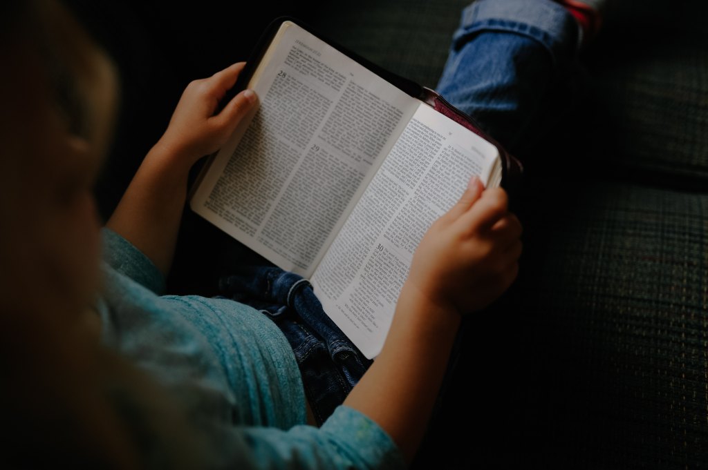Child holding book