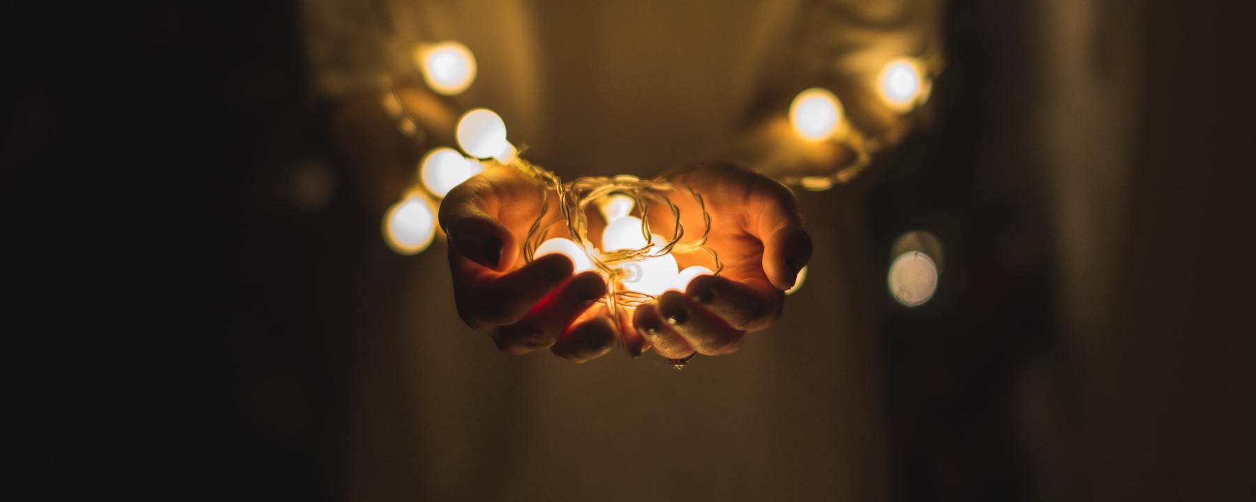 hands filled with light