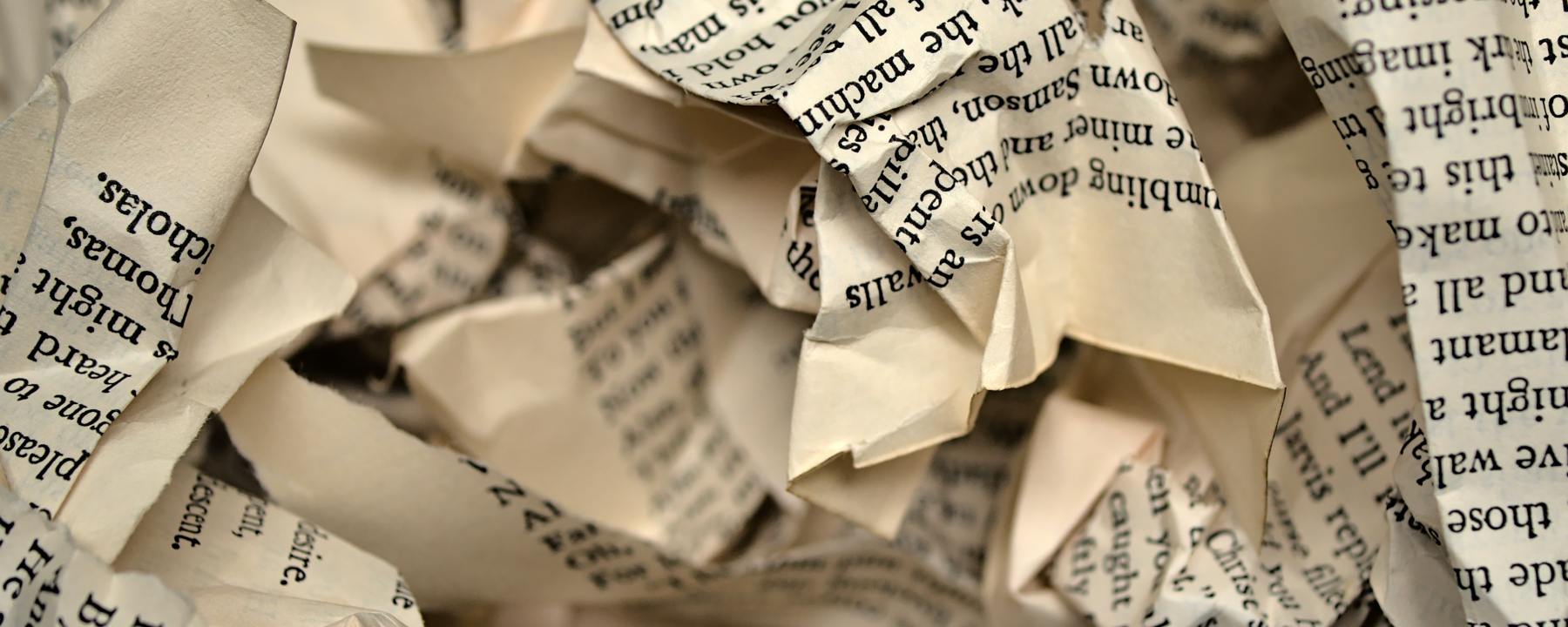 pages of a book torn and crumpled