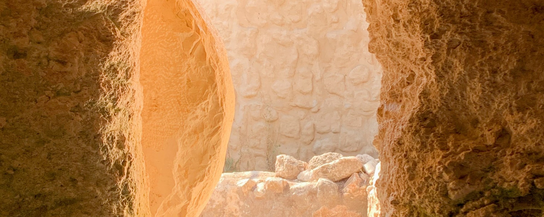 open tomb with sunlight pouring in