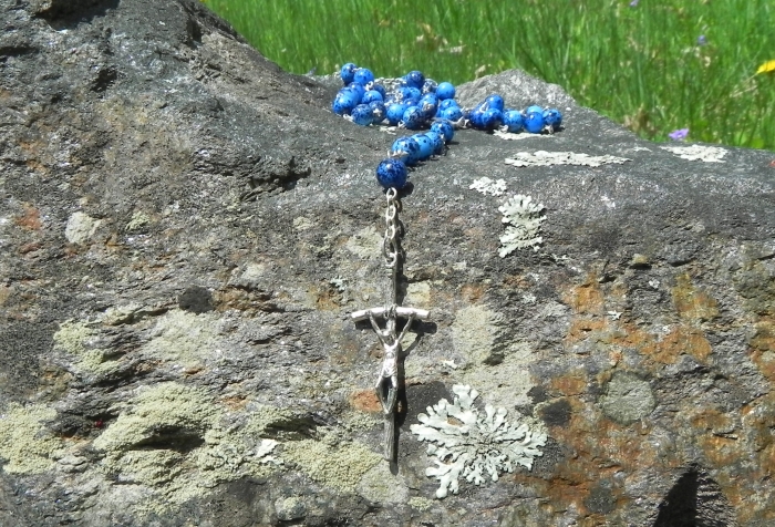 the rosary on a rock