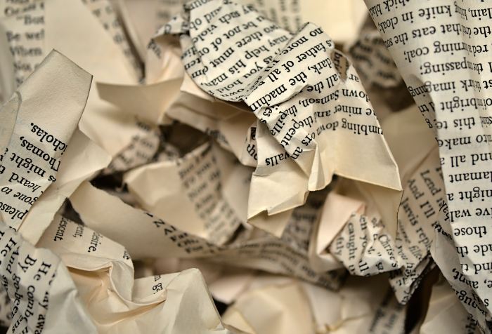 torn and crumpled pages of a book
