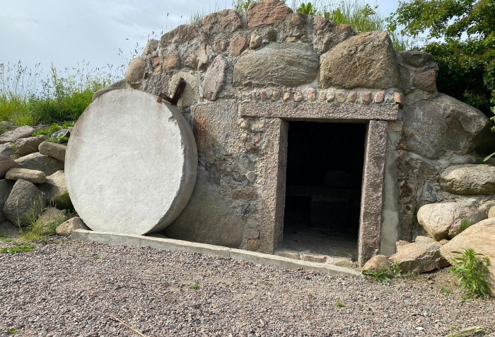 An open tomb with the stone rolled away